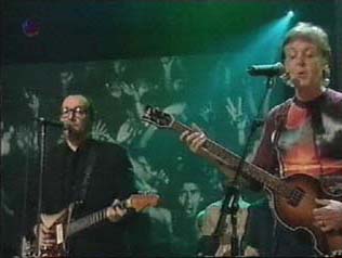 Paul McCartney accompanied by Elvis Costello