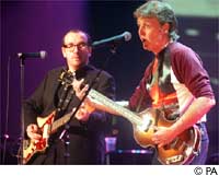 Paul McCartney accompanied by Elvis Costello